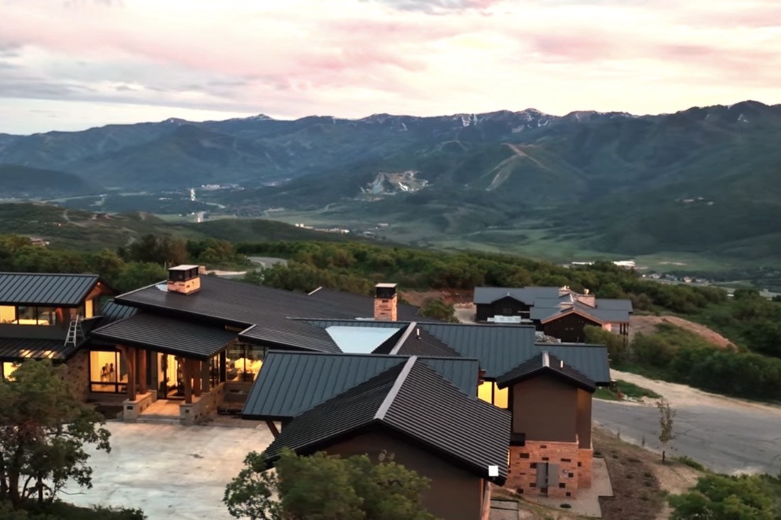 Aerial view of the property with the valley and mountains beyond