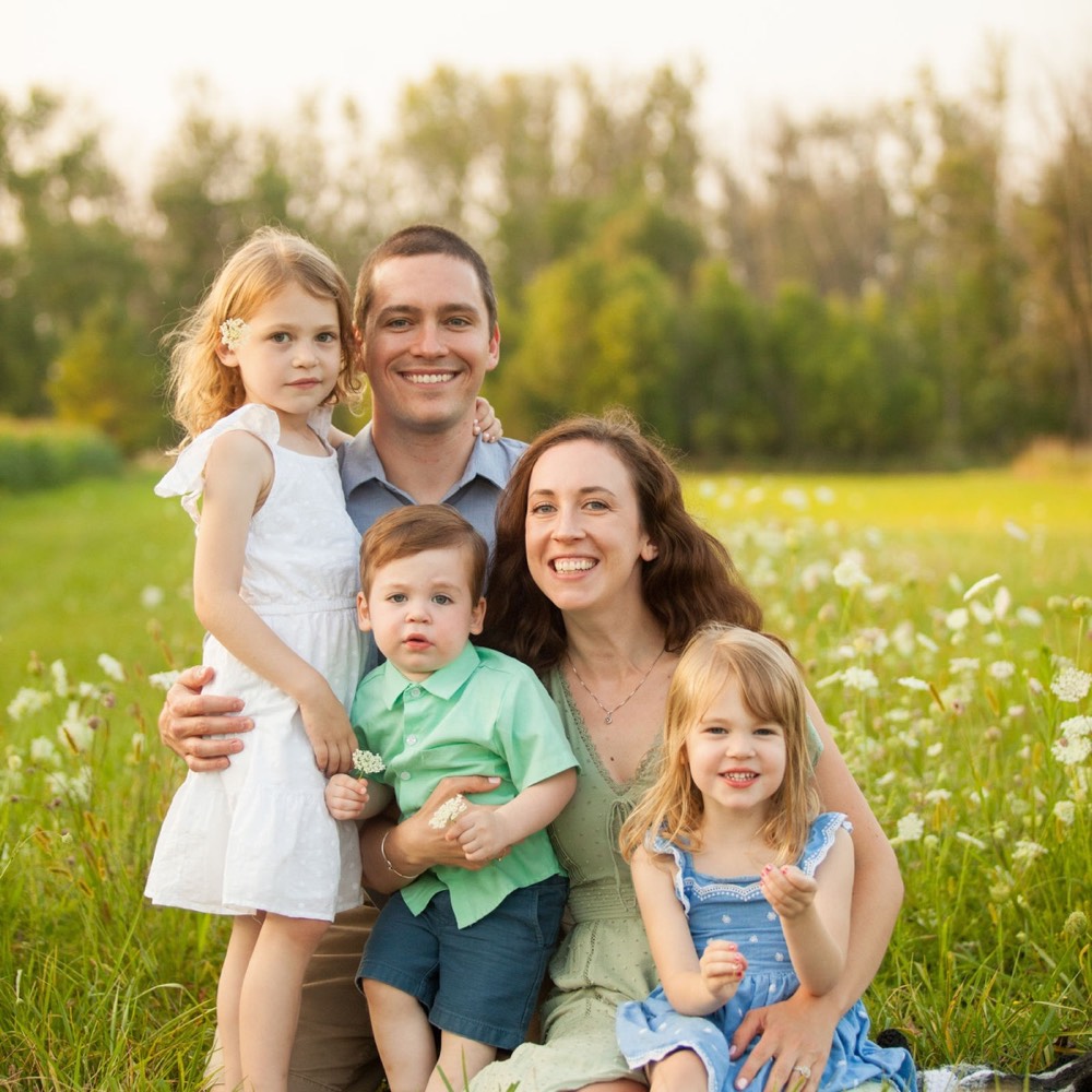 A family photographed outdoors by Boehlke Media