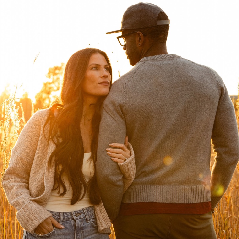 A couple photographed outdoors in natural light