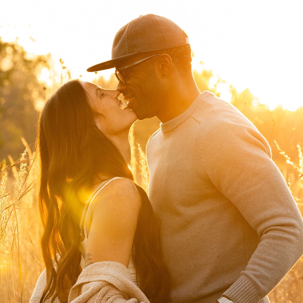 A couple photographed outdoors in natural light