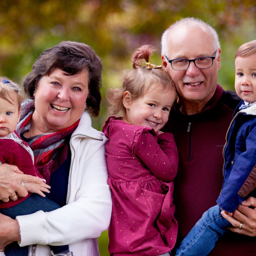 A family photographed outdoors by Boehlke Media