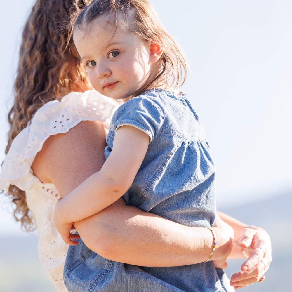 A family photographed outdoors by Boehlke Media