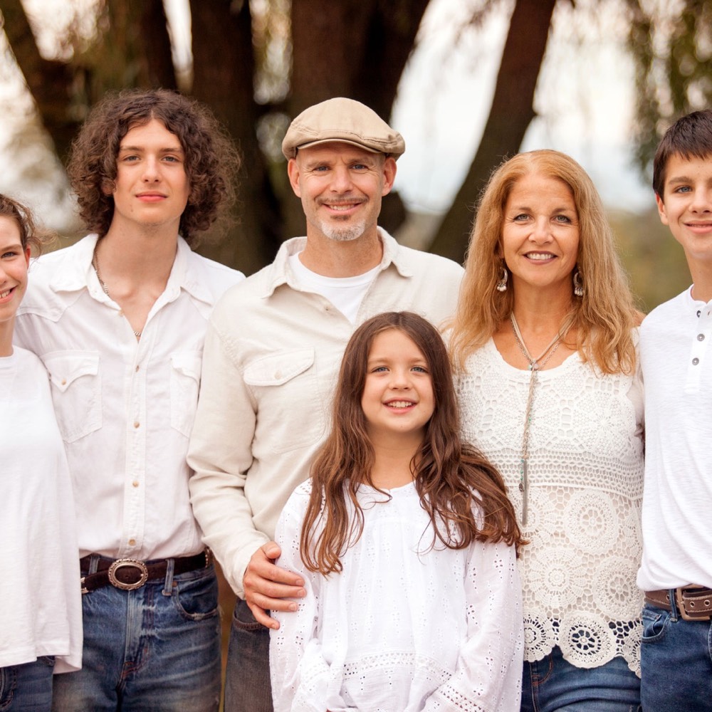 A family photographed outdoors by Boehlke Media