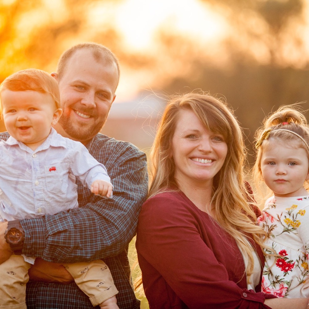 A family photographed outdoors by Boehlke Media