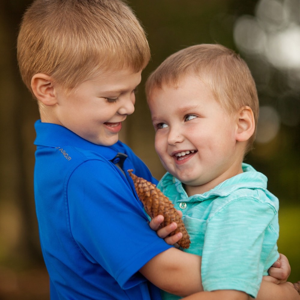 A family photographed outdoors by Boehlke Media