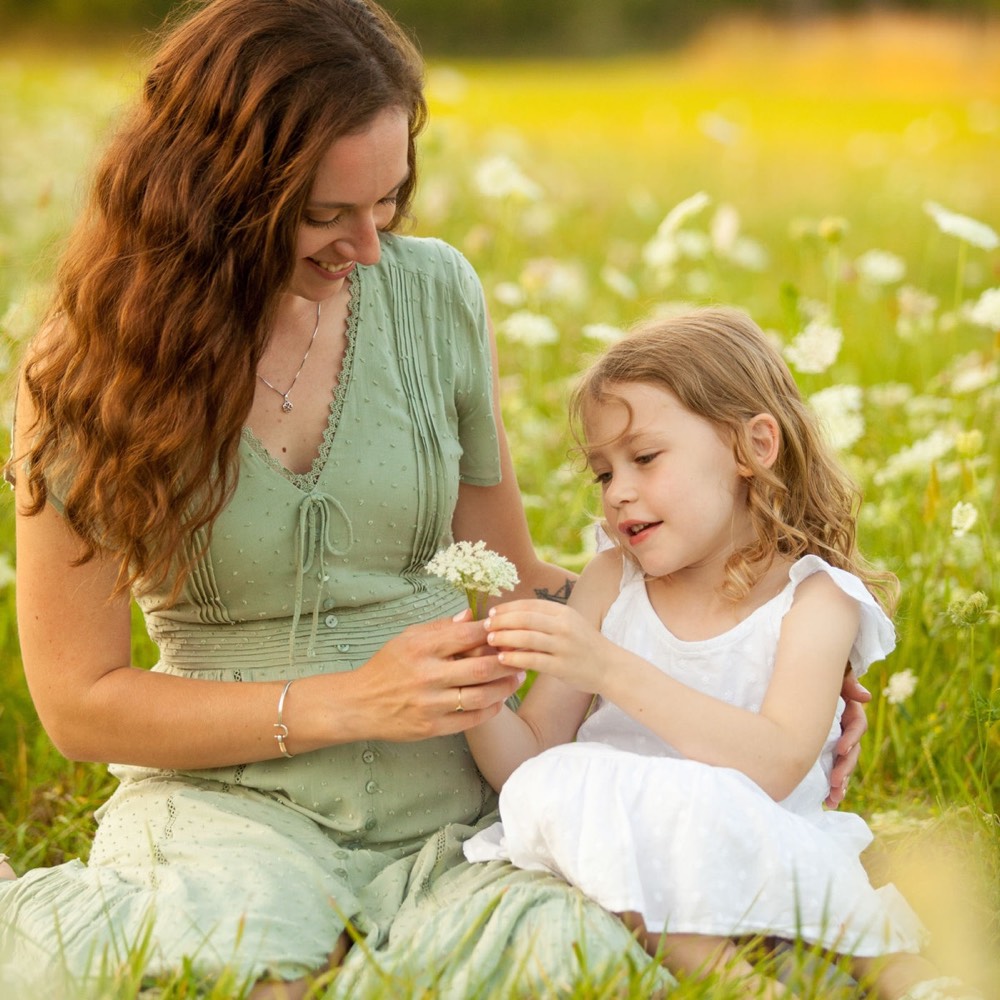 A family photographed outdoors by Boehlke Media
