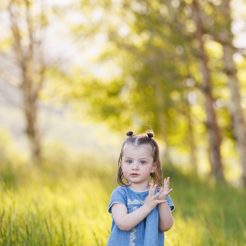 A family photographed outdoors by Boehlke Media