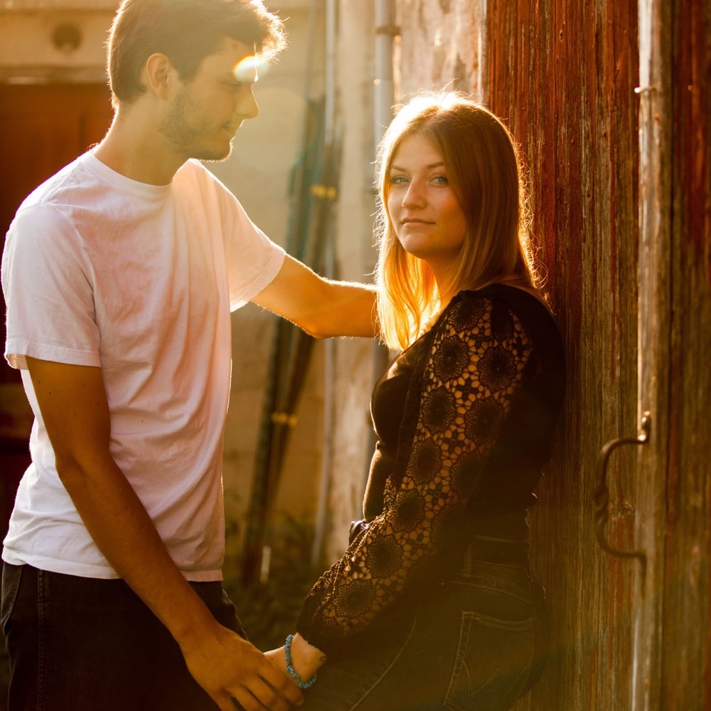 A couple photographed outdoors in natural light