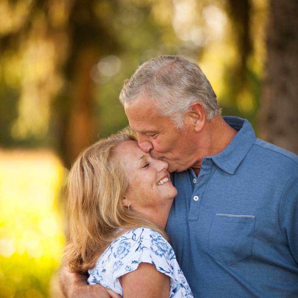 A family photographed outdoors by Boehlke Media