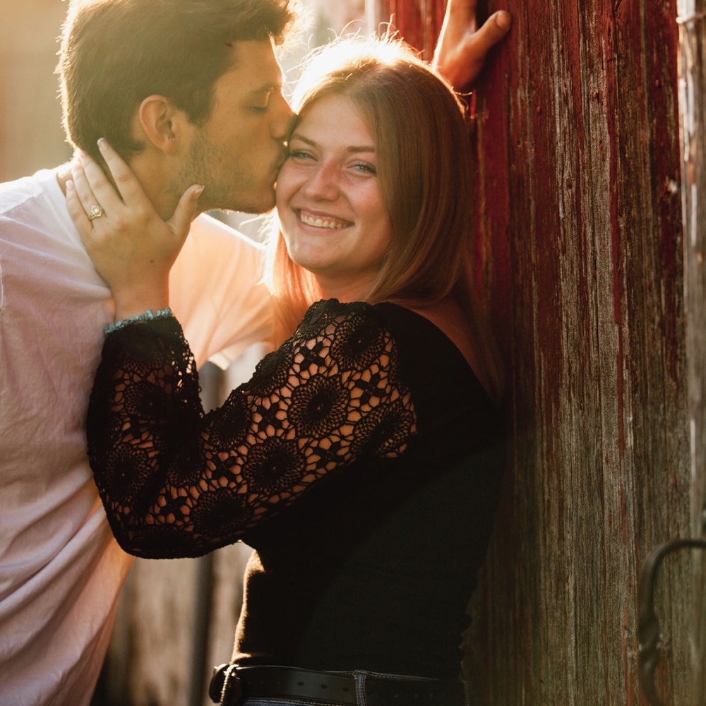 A couple photographed outdoors in natural light